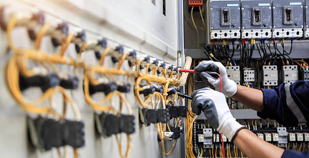 Professional Electrician technician working in Highland Heights, KY